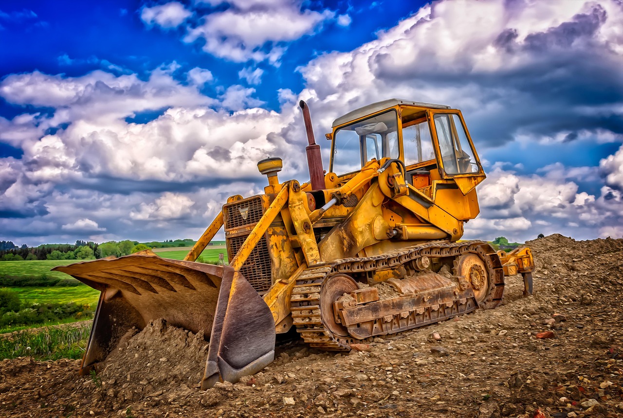 skid steer grading dirt